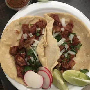 Handmade tortillas tripa tacos. Absolutely delicious