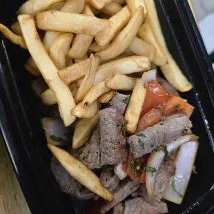 Lomo Saltado.   Measly portion for $24.