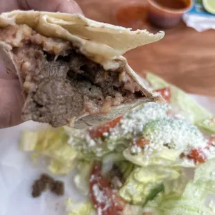 Burrito half eaten this is super good