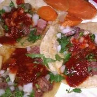 Lengue tacos $1