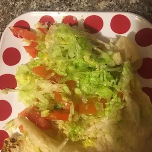 It was nothing but lettuce with a handful of pieces tomatoes wrapped in a flour tortilla