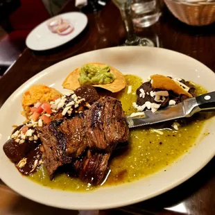 Tampquea; skirt steak with a chicken mole Enchilada.