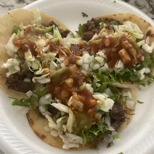 Barbacoa and asada taco