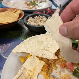 Tortillas extremely dry and cold (both corn and flour) Rice was watery and overcooked