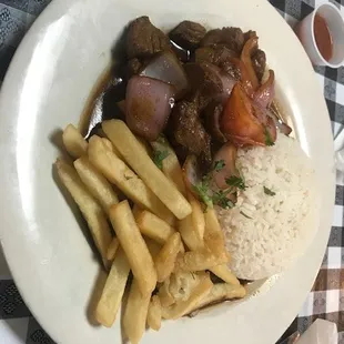 Steak, onion, fries and rice