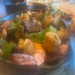 Three meat fajita