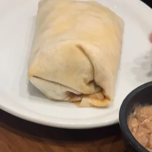 Burrito with raw tortilla.
