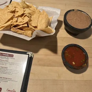 Massive bowl of chips and beans with salsa