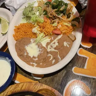 Side salad with rice and beans.
