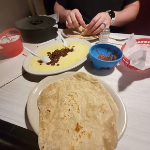 a person preparing a meal