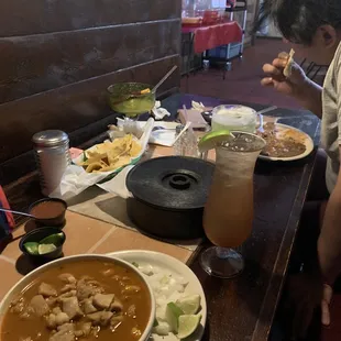 Menudo, carne guisada , Chile and salsa. Drinks!!