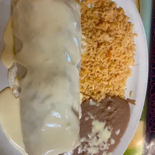 Carnitas burrito...add the jalapeño sauce. You won't be disappointed