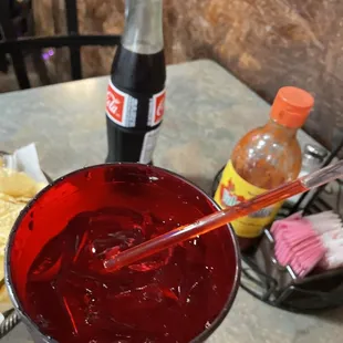 a red drink in a glass