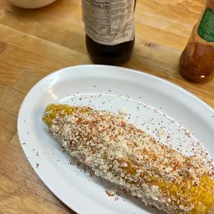 a corn on the cob on a plate
