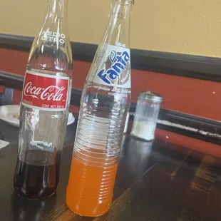 Medio litro coke and fanta orange