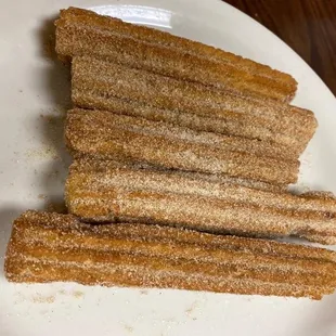 a plate of churros