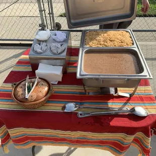 Rice and beans included in the taco service