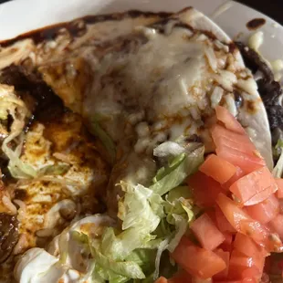 Half eaten fiesta burrito