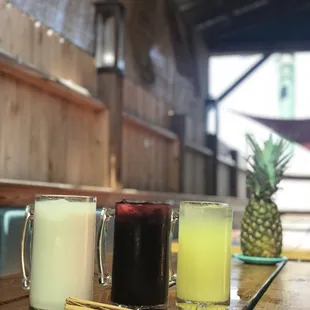  three drinks on a table