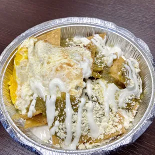 Chilaquiles - Really loved this dish! Nice slightly spicy green salsa, crispy homemade chips and runny eggs + cheese. definitely get again.