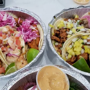 Tacos with shrimp, fish, al pastor and pork shoulder