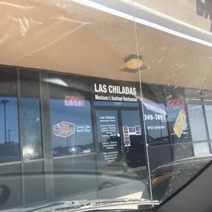 a view of the outside of a restaurant