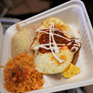 a close up of a meal in a styrofoam container
