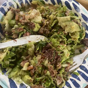 a plate of salad on a table
