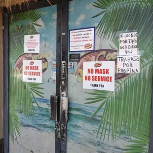 a closed door to a restaurant