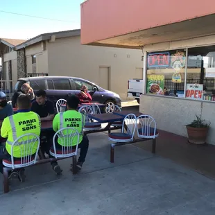 a group of people sitting at a table