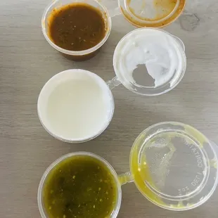 Top: hot sauce, sour cream and bottom: medium sauce, all so good!