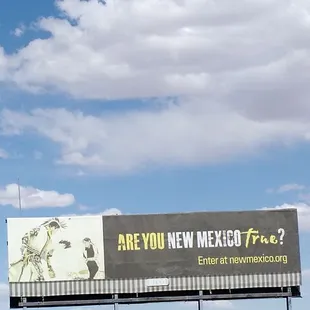 Billboard that also includes Las Cruces.