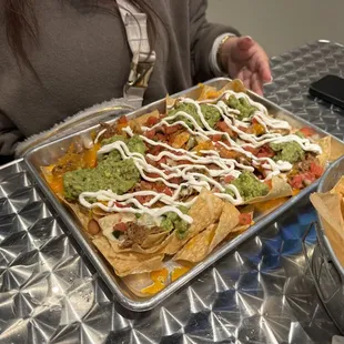 Smoked pork nachos.