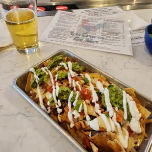 pork nachos on happy hour menu, good