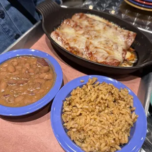 Tinga chicken enchiladas.