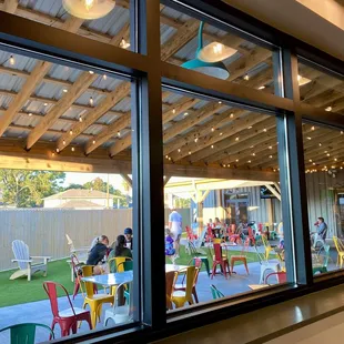 Outside seating available with grassy area for your kids to play.