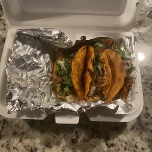 Lamb, chicken, and steak Burris taco