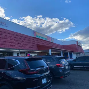 cars parked in front of the store