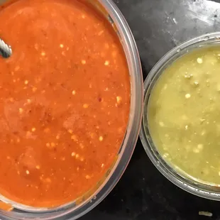Red and green salsa! Both taste good and both have a kick. Red is hotter gotta check it out