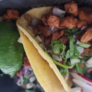two tacos and a lime