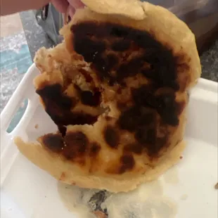 Inedible burnt pupusa