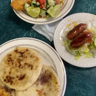 Pupusas, pastelitos, and chorizos