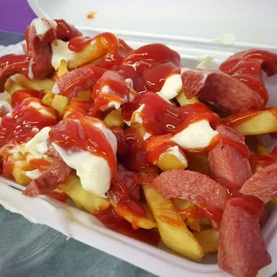 Salchipulpos - $5. French Fries with Hot Dogs