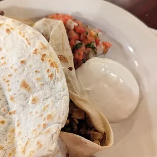 Chicken and steak burrito