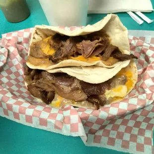 My second favorite taco chorizo beans with cheese and bacon homemade tortillas you can't get that nowhere else.