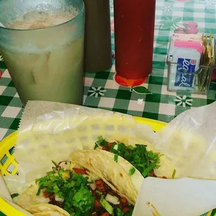 Tacos al pastor y agua de horchata!! Yum!!