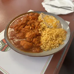Potatoes de chicken rice and beans plate