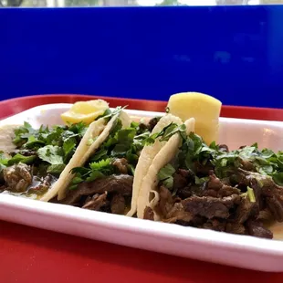 Asada tacos with green sauce