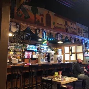 a man sitting at a bar