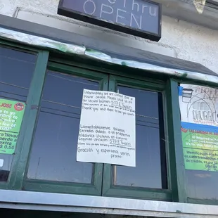 a sign on the front of a restaurant